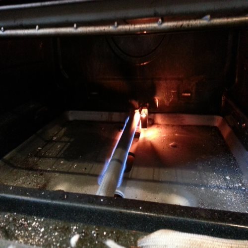 gas oven burner lit up